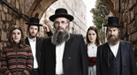 Posed photo of "Shtisel" cast members in costume